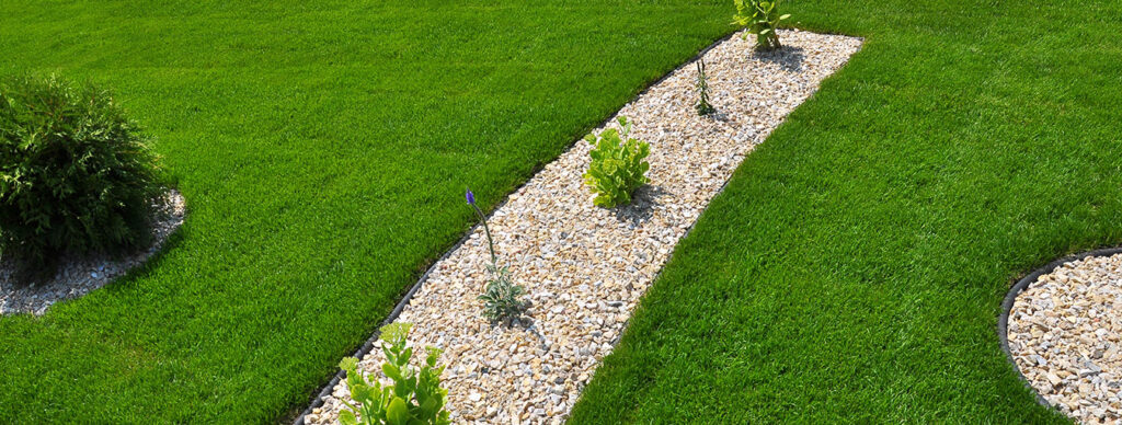 gravel landscape next to artificial turf