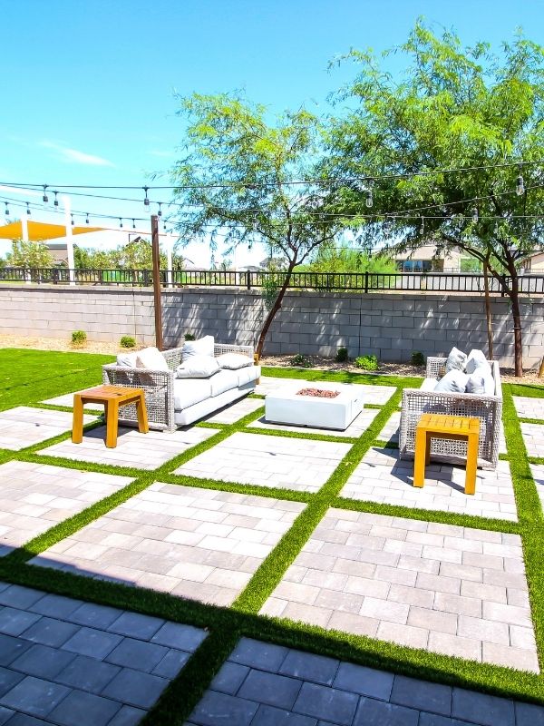 A patio that has artificial turf installed to create a nice clean natural look. 